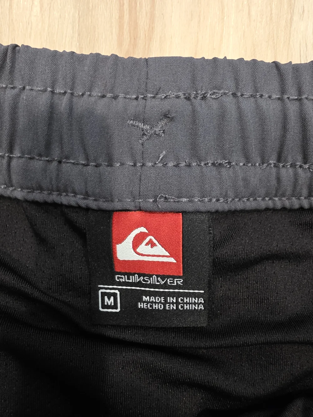 Quiksilver Black Swim Trunks with Gray Floral Side Panels